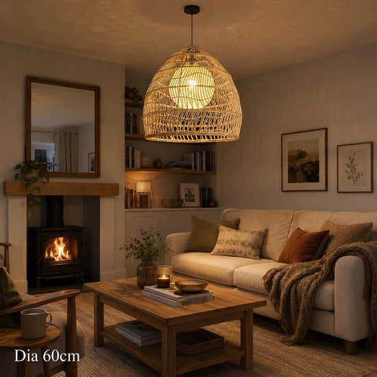 60cm rattan pendant light with yellow inner sphere in a cosy living room